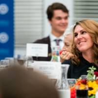 Audience smiling at speaker